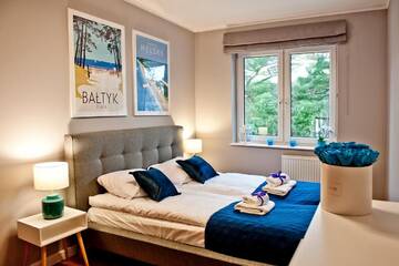 Фото номера One-Bedroom Apartment - 63/15 Ratibora Street Апартаменты BlueApart Apartamenty Jurata г. Юрата 3