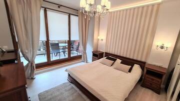 Фото номера Улучшенные апартаменты Апартаменты Apt Miedzymorze - Apartamenty Wypoczynkowe г. Юрата 34
